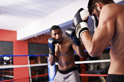 Buy stock photo Men, boxing ring and gloves for fight competition in gym for challenge practice as opponents for workout, exercise or winner. Male people, punch and athlete progress for battle, performance or cardio