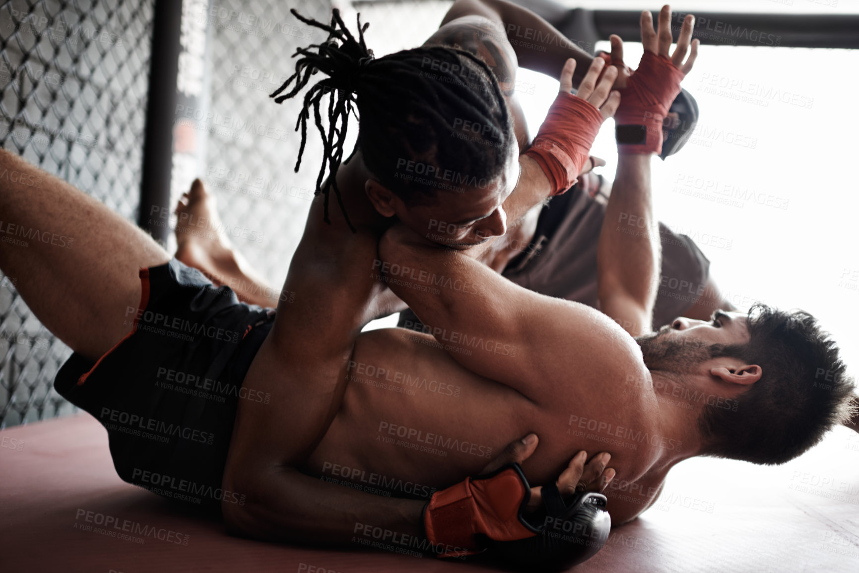 Buy stock photo Fight, wrestling and men on floor for kickboxing competition, challenge and fitness with sports in gym. Match, strong fighter and resilience in exercise, sparring practice or power in battle together