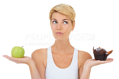 Buy stock photo Woman, fitness and health for diet option, nutrition and decision by studio for lifestyle. Female person, athlete and decide for food, workout and white background with apple and cake choice