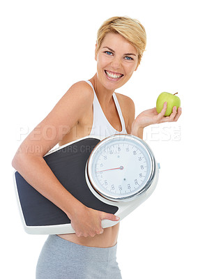 Buy stock photo Cropped shot of a young woman holding an apple