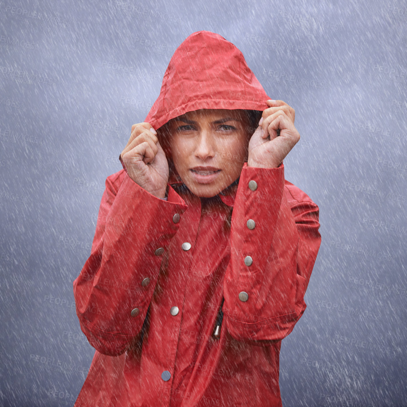 Buy stock photo Woman, hood and portrait with rain, coat and clouds with protection in nature. Person, face and storm with cloudy, winter and waterproof hat for safety and confidence with adventure or vacation
