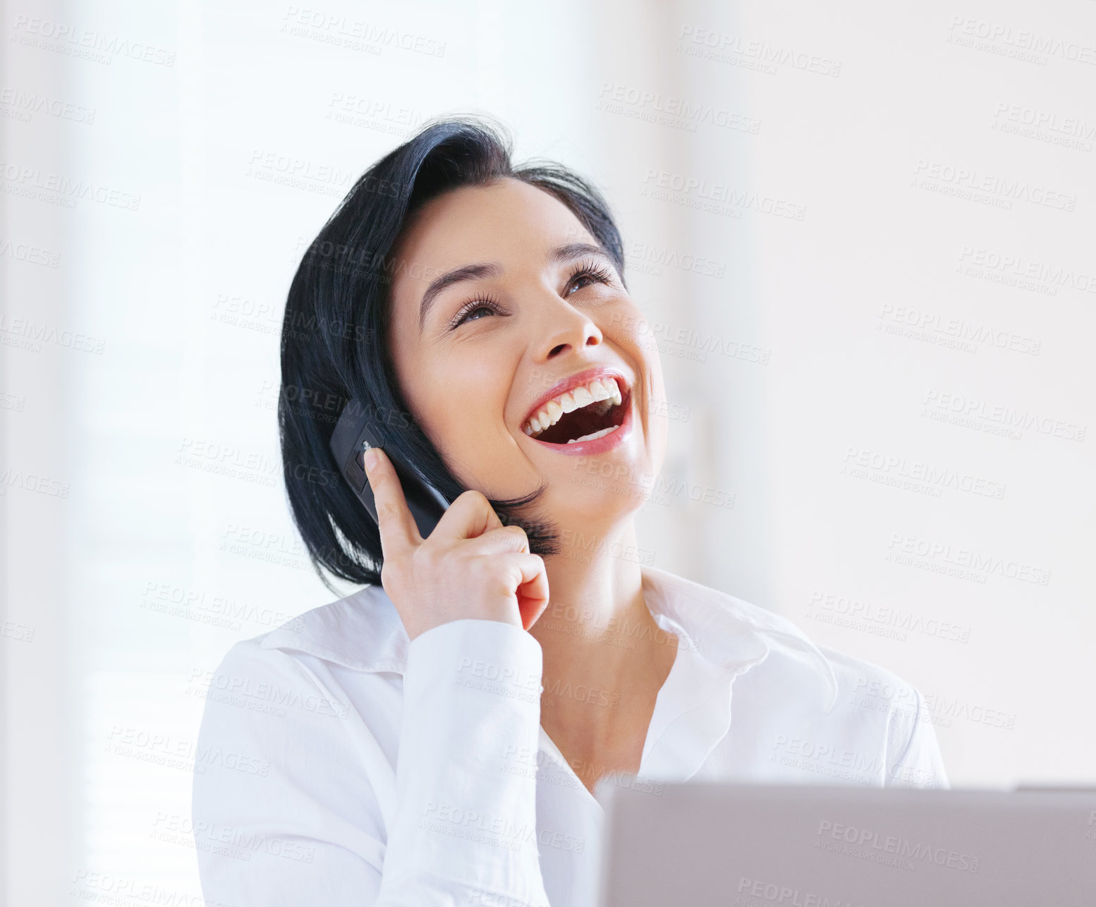 Buy stock photo Woman, business and laughing with laptop, phone call and conversation while working as Administrative Assistant. Female person, employee and cellphone for communication, career and happiness with pc