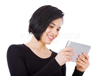 Buy stock photo Smile, tablet and woman reading online content on the internet or social media isolated in a studio white background. Excited, connection and female person typing email or search a website or web