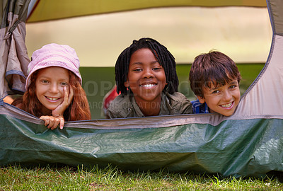 Buy stock photo Portrait, happy and children in tent for camp on vacation, adventure or holiday with fun. Smile, travel and young kids bonding together in outdoor field, forest or woods on summer weekend trip.