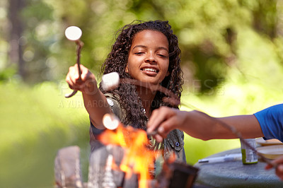 Buy stock photo Fire, marshmallow and kids in nature for camping, learning or fun bonding in a park together. Bonfire, family or children in a forest for candy puff roast, cooking or campfire tradition in nature
