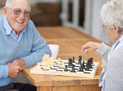 Buy stock photo Happy, couple and senior in game of chess together to relax in retirement on holiday or vacation. Elderly, man of woman outdoor with smile for winning competition, checkmate or activity with strategy