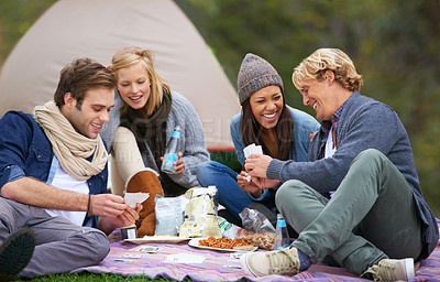 Buy stock photo Nature, camping and friends on picnic with food laughing, talking and bonding on vacation. Happy, travel and group of people eating lunch in outdoor field, park or forest on holiday or weekend trip.