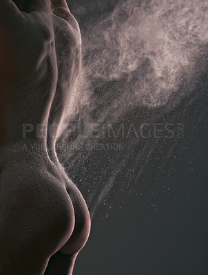 Buy stock photo Cropped shot of a young woman posing nude in the studio