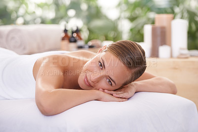 Buy stock photo A young woman on a massage table in a spa