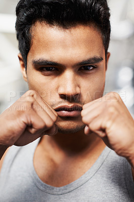 Buy stock photo Man, portrait and boxing with confidence, closeup and fists ready to punch in match for training and exercise. Male person, workout and focus in gym, mma and boxer for sports and combat for defence