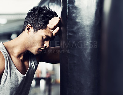 Buy stock photo Fitness, punching bag or tired man at gym with low energy, loss or performance fail or mistake. Sports, fatigue or male boxer exhausted by intense body workout, challenge or fighting practice burnout