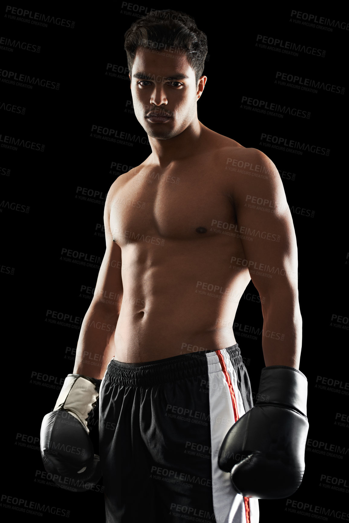 Buy stock photo Portrait, man and boxer in studio for sports, training and workout for healthy body isolated on a black background. Fighter, serious athlete and person with gloves for fitness or exercise in Brazil