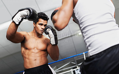 Buy stock photo Boxer, man and fight in boxing ring for practice, training or confidence for performance with coach or fitness. Professional, athlete or exercise for competition, match or sport with personal trainer