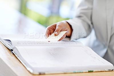 Buy stock photo Woman, hands and credit card with book for payment, transaction or purchase for appointment or reservation. Hand of female showing debit at reception to buy, pay or shopping for booking or check in