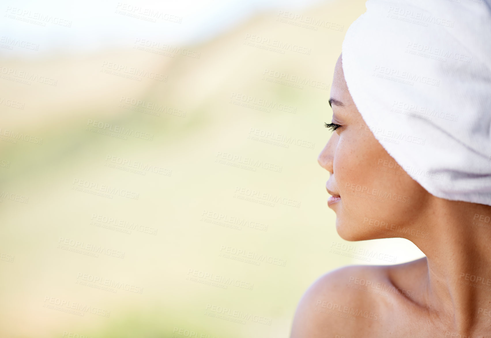 Buy stock photo Woman, thinking and spa with towel outdoor with calm and peace from beauty and skincare treatment. Mockup, hotel and wellness with skin, glow and wellbeing at resort with facial and cosmetics care