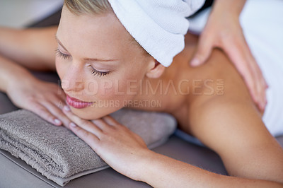 Buy stock photo Relax, calm and a woman at a spa for a massage, body treatment and masseuse care. Luxury, sleeping and a young lady at a salon for back massaging, relaxation and peace on a vacation with a therapist