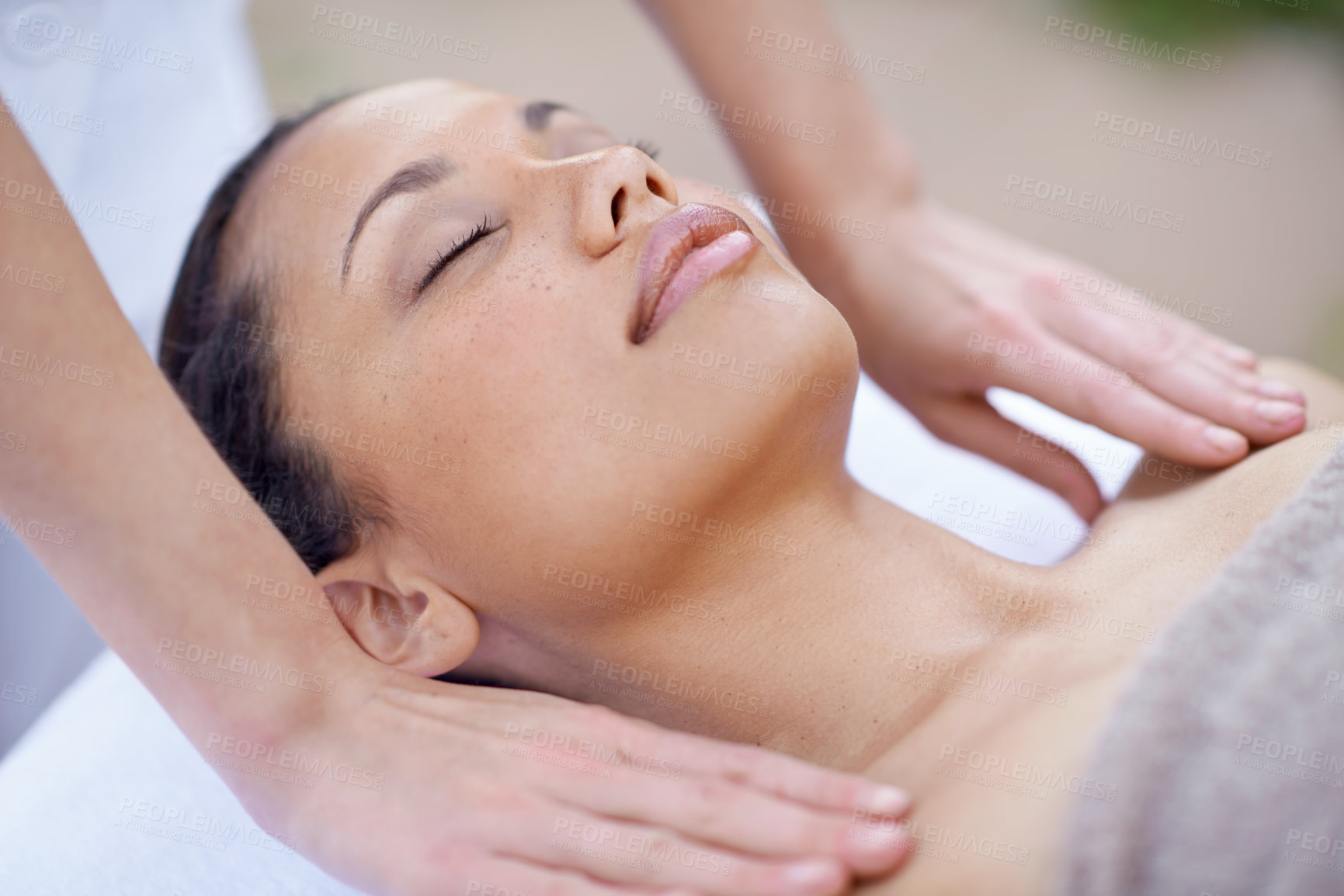 Buy stock photo Spa, relax and woman for a massage with therapist hands on body for wellness and health. Face of a calm female client or customer on a table for peace, physical therapy and luxury zen treatment