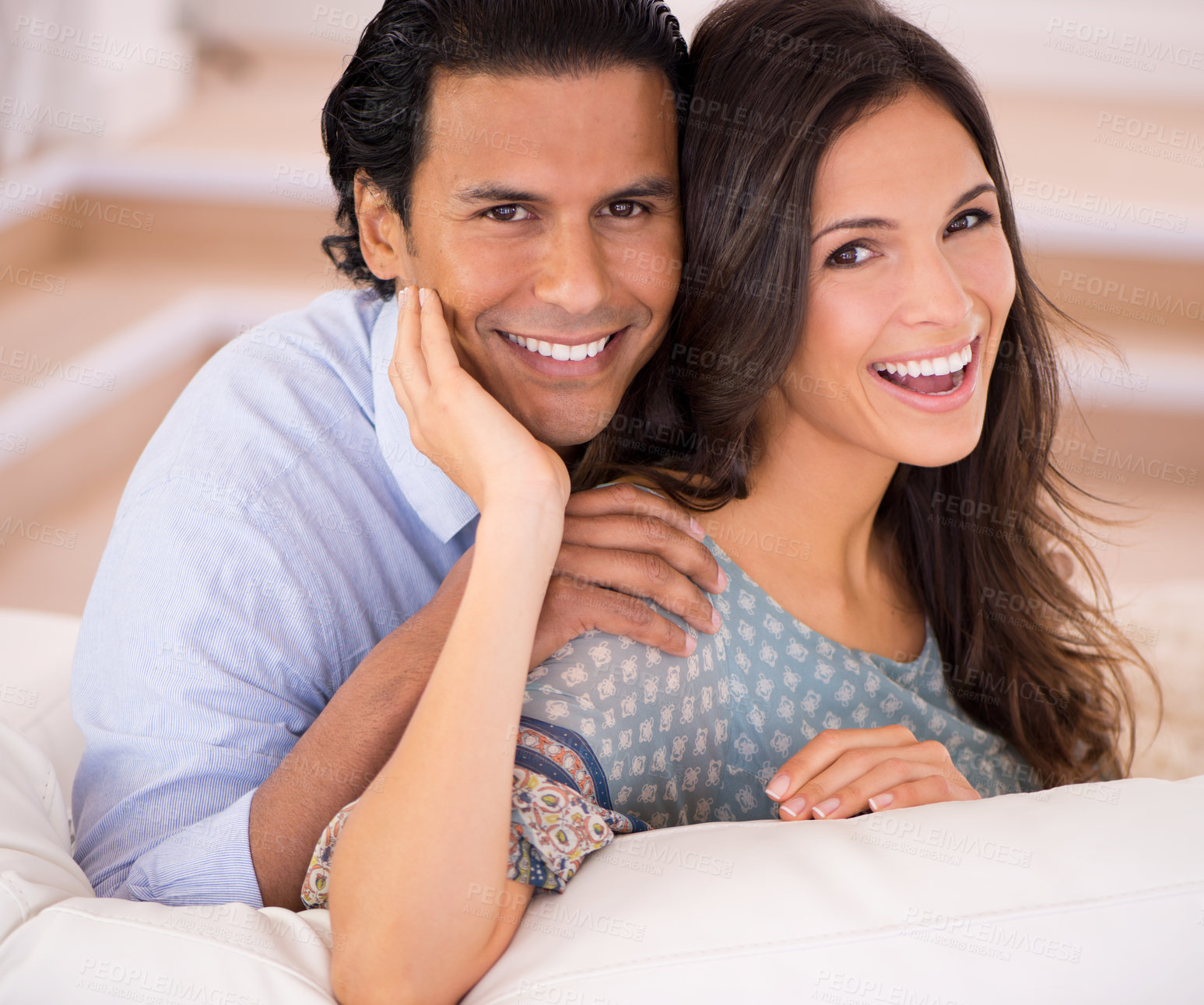 Buy stock photo Smile, romance and portrait of couple on sofa for weekend bonding, embrace and connection in home. Love, support and trust in marriage, happy man and woman on couch with embrace, wellness and hug.