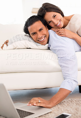 Buy stock photo Couple, portrait and laptop on couch in living room for  watching movie, scroll and bonding together at home. Relax, man and woman lying down on sofa in lounge with technology for online streaming.