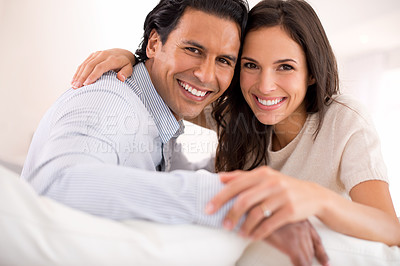 Buy stock photo Embrace, love and portrait of couple on couch for weekend bonding, romance and connection in home. Happy, support and trust in marriage, man and woman hug on sofa with relax, wellness and smile.