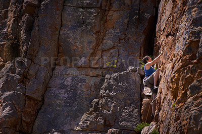 Buy stock photo Woman, mountain climbing and outdoors for adventure, fitness and exercise in the sun for extreme sports. Female person, rock workout and nature for wellness, risk and fearless activity for strength 