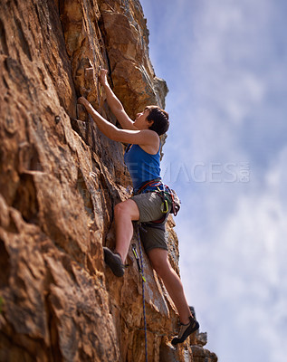 Buy stock photo Rock climbing, woman and fitness with adventure, travel and gear to explore in nature on a mountain. Cliff, hiking and sport with athlete and rope for workout, exercise and climber training outdoor