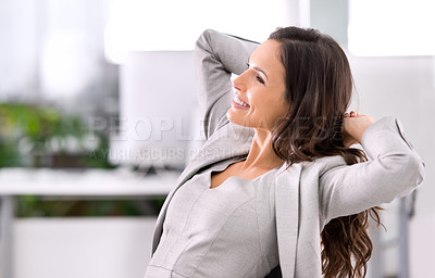Buy stock photo A relaxed young businesswoman feeling positive