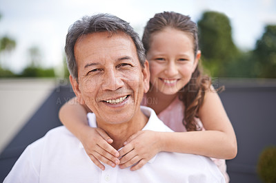 Buy stock photo Portrait of a young girl and her grandfather spending time together