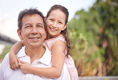 Buy stock photo Portrait of a young girl and her grandfather spending time together