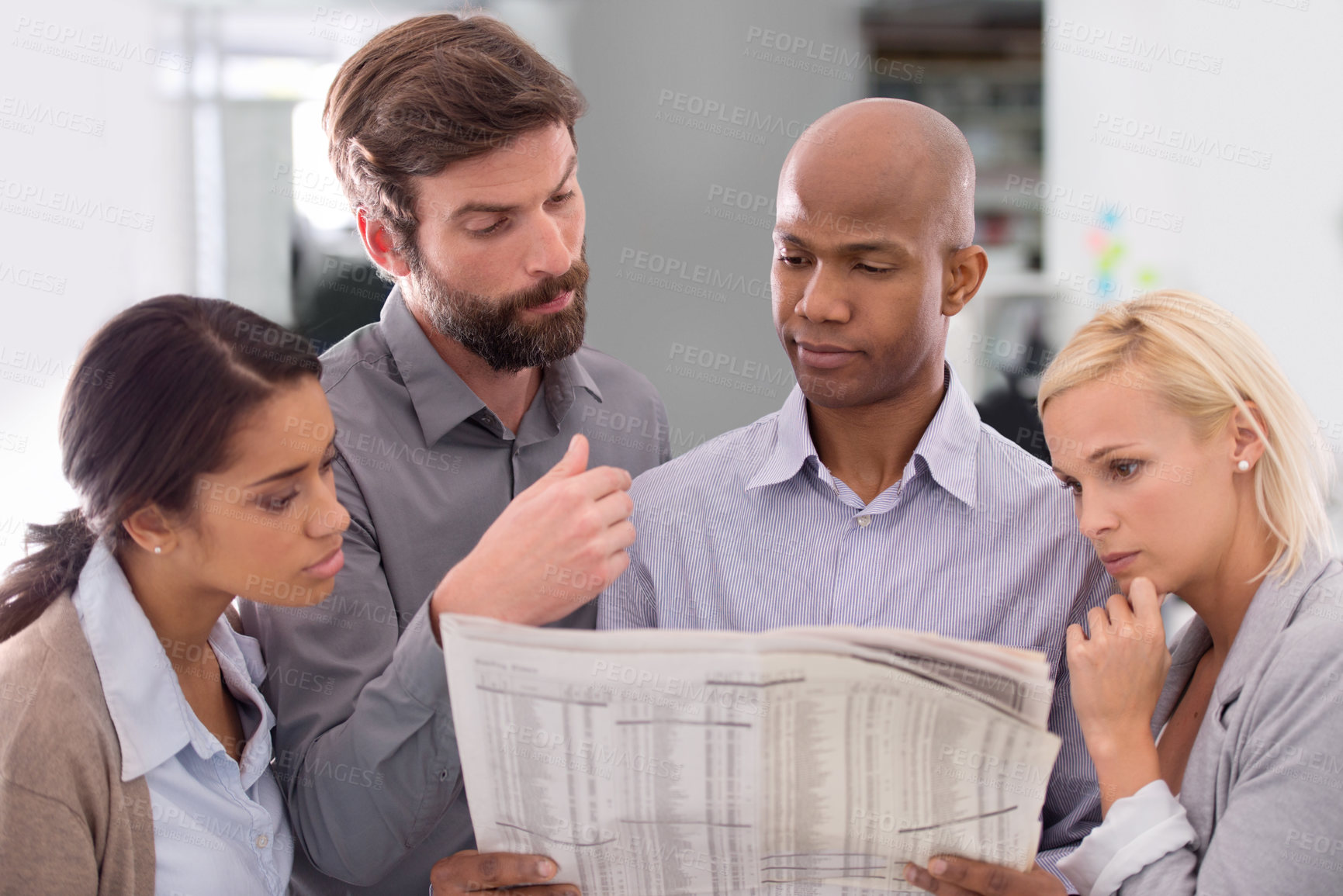 Buy stock photo Business people, newspaper and thinking in team building for information, crossword game or search at office. Group of employees with document or paperwork in planning or problem solving at workplace