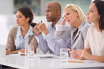 Buy stock photo Meeting, presentation and audience of confused business people for teamwork, collaboration and discussion. Corporate, company and men and women for feedback, thinking and problem solving in office