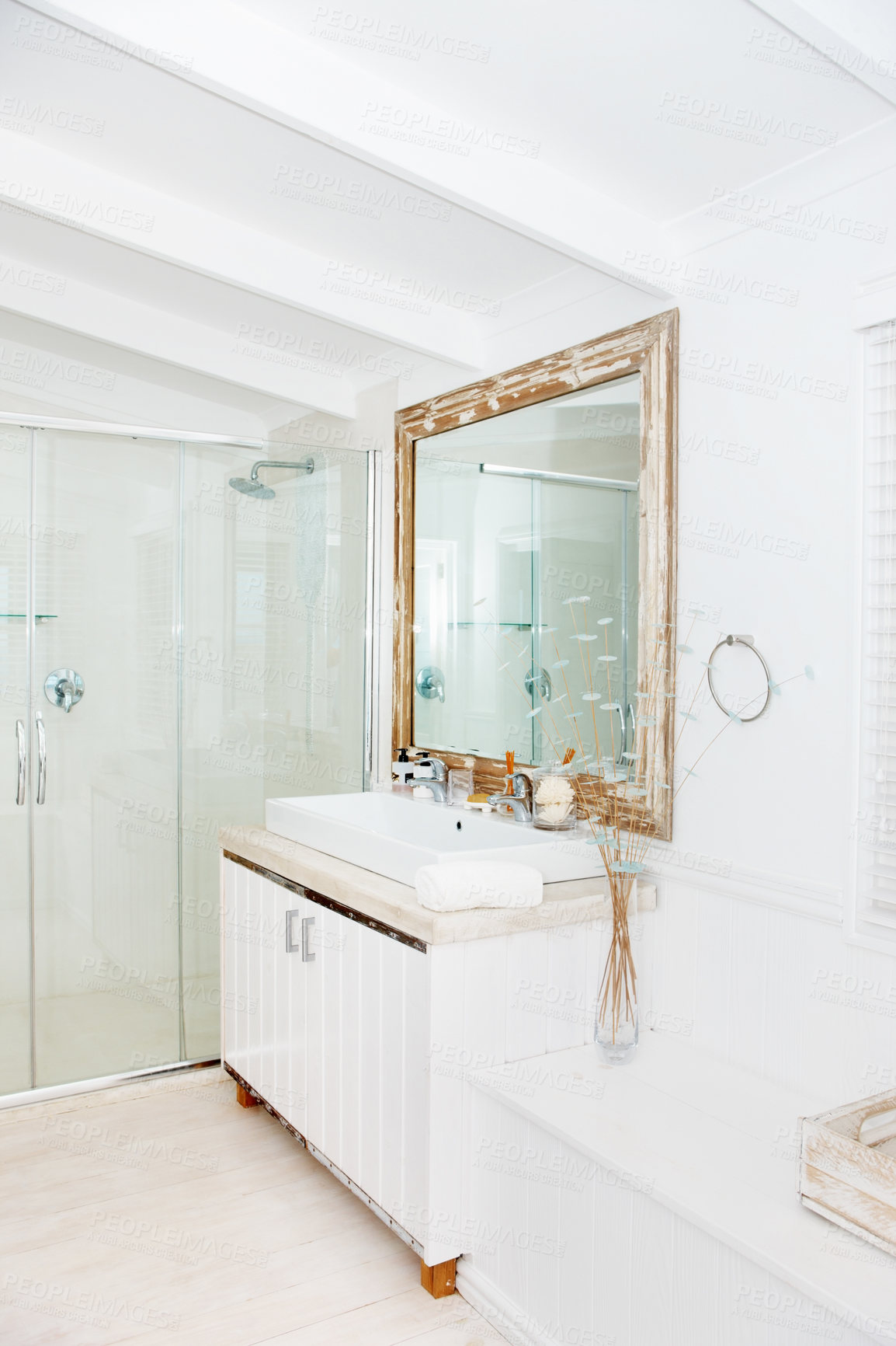 Buy stock photo Luxury, mirror and shower in the bathroom interior of a modern home or apartment for lifestyle. Hotel, real estate or wealth with marble, ceramic tiles and a vanity against a wall for design