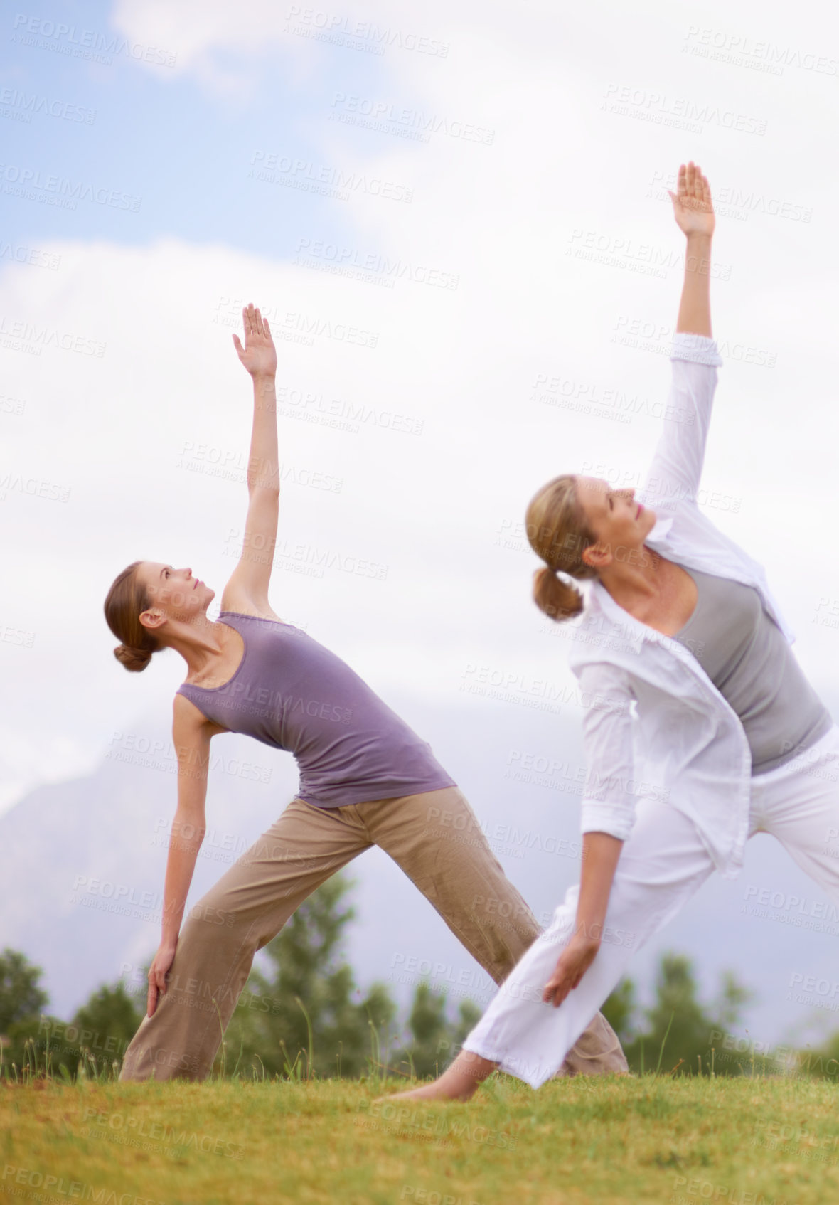 Buy stock photo Friends, women and triangle pose for yoga outdoor, healthy body and exercise for fitness. Park, pilates and people in nature for balance, stretching and practice together for wellness with coach