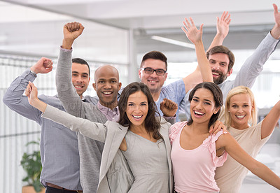 Buy stock photo Cropped shot of a group of businesspeople smiling and raising their hands