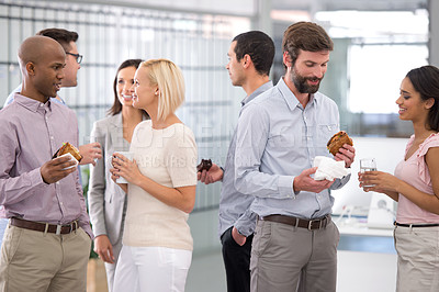 Buy stock photo Business people, group and lunch in office with conversation, chat and networking with smile for diversity. Team, staff and employees with team building, happy and talking on break, food and drink