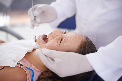 Buy stock photo Girl, child and dentist with tools for healthcare, gum disease and oral hygiene with mouth inspection. Medical, orthodontics and consultation for teeth health, happiness and wellness with excavator