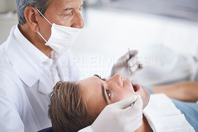 Buy stock photo Dental care, man and dentist with tools for healthcare, gum disease or oral hygiene with mouth inspection. Medical, orthodontics and consultation for teeth health, cleaning or wellness with excavator