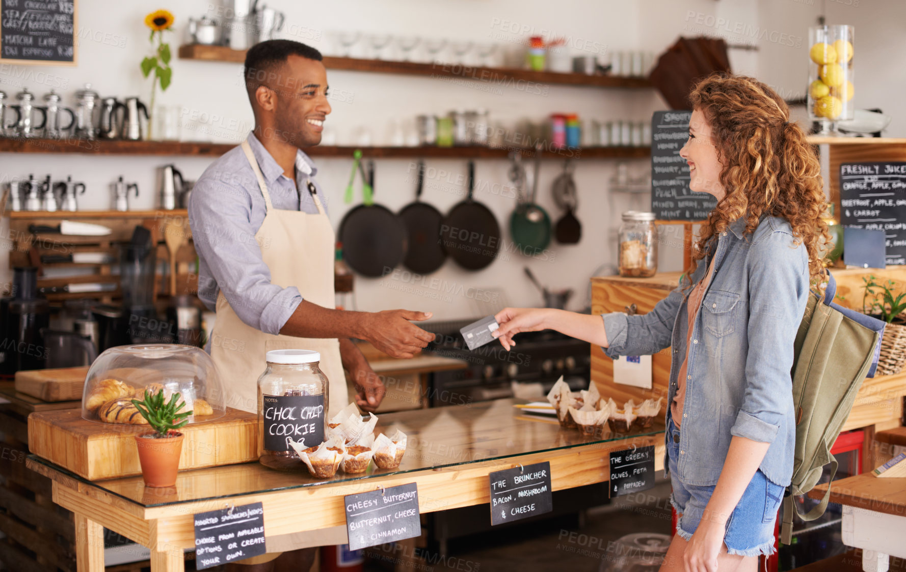 Buy stock photo Shot of two people in a cafe