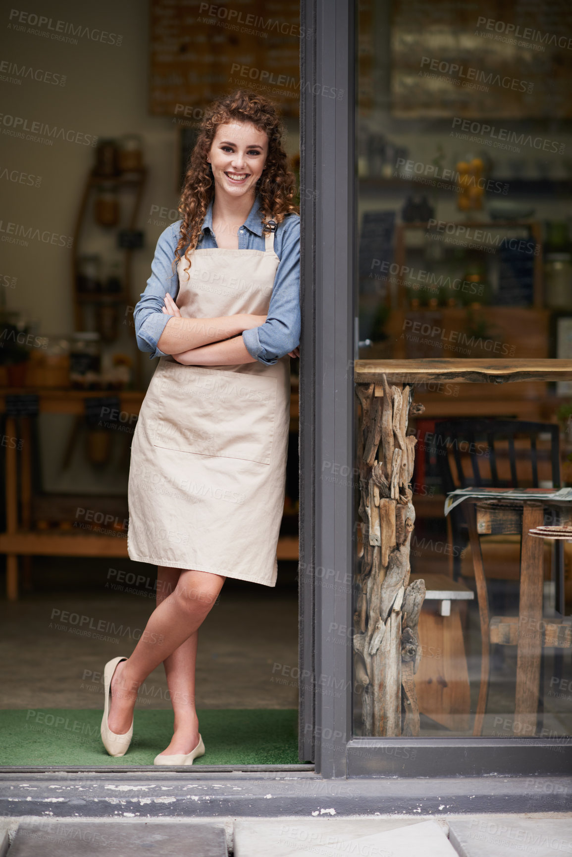 Buy stock photo Happy, arms crossed and portrait of woman at restaurant for small business, coffee shop or waiter. Entrepreneur, retail and smile with female barista at front door of cafe for diner and food industry