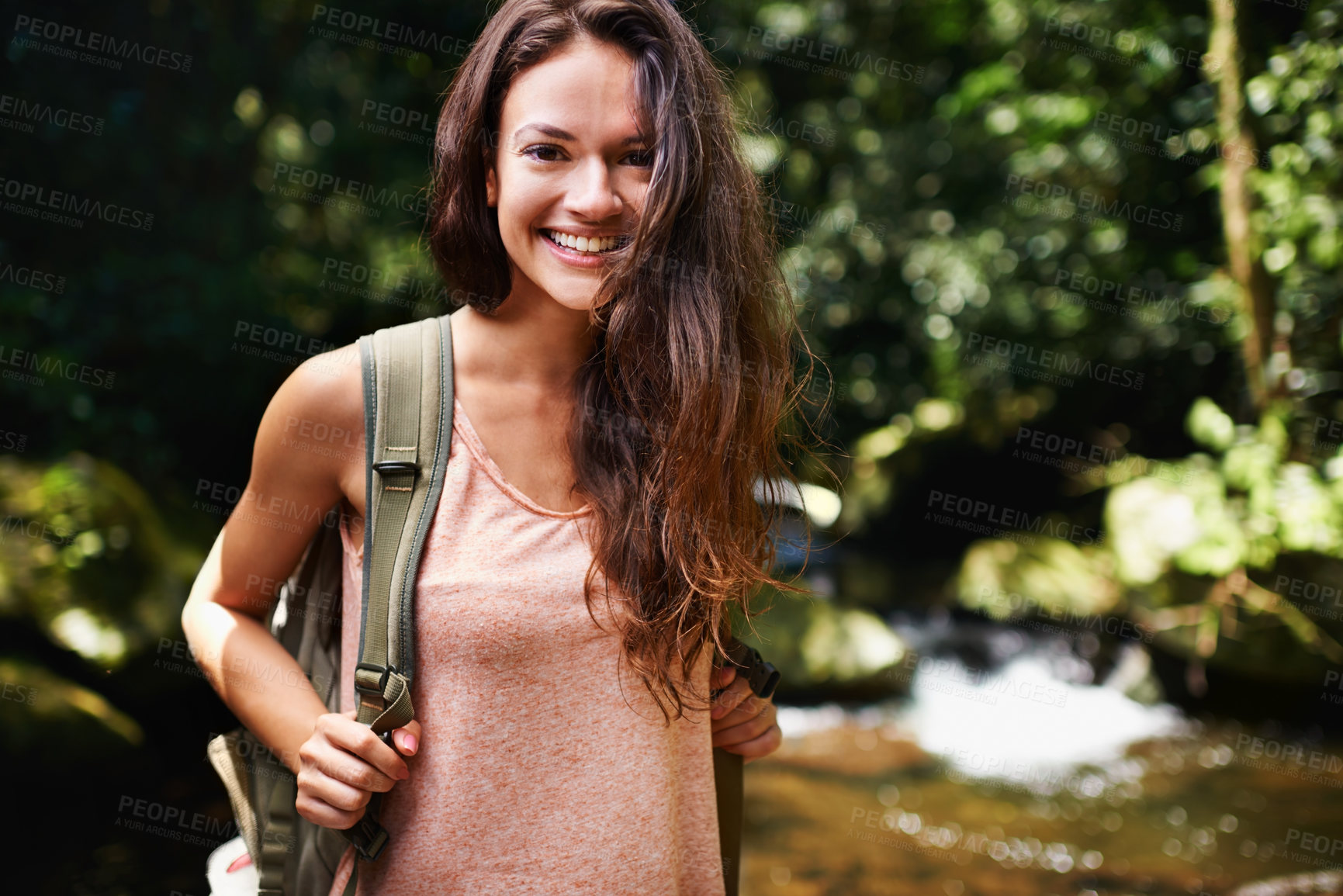 Buy stock photo Nature, smile and portrait of woman hiking with backpack for outdoor adventure trail on vacation. Happy, travel and female person with bag for trekking in forest or woods on weekend trip in Canada.