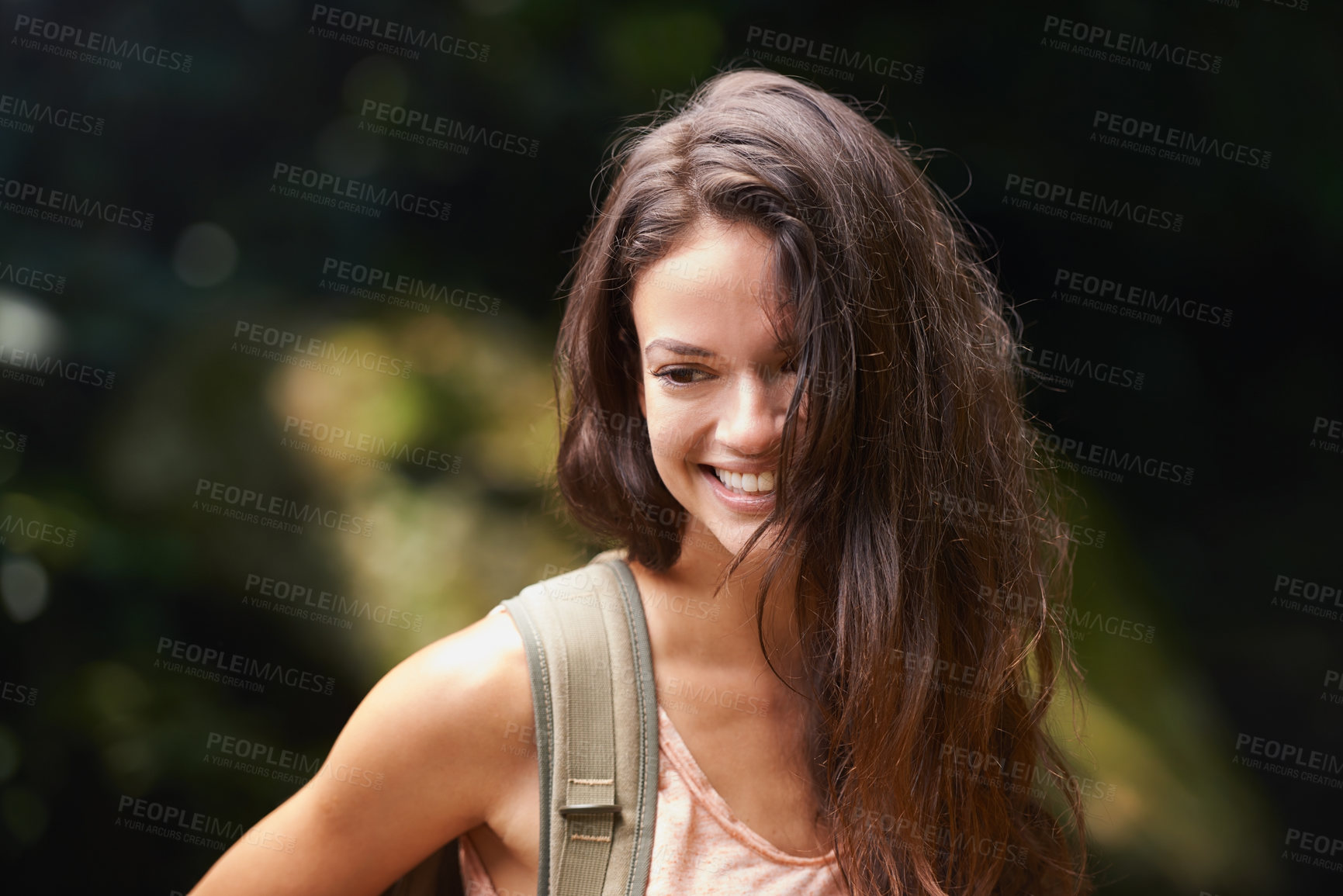 Buy stock photo Hiking, backpack or happy woman in nature, woods or wilderness for trekking or outdoor adventure with bag. Smile, relax or hiker walking in natural park or forest for exercise or wellness on holiday