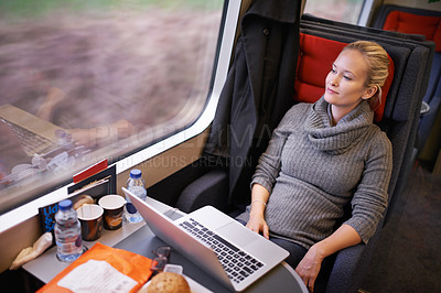 Buy stock photo Woman, train and window thinking with laptop on travel journey in Canada or future destination, thoughts or network. Female person, wandering and railroad transportation or relax, internet or commute