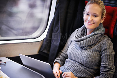 Buy stock photo Travel, laptop and portrait of woman on train for commute, journey and business trip on public transport. Happy, passenger and person on computer for remote work, website and typing email in carriage