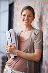 happy woman in gray blouse with documents