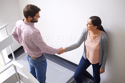 Buy stock photo Man, woman and shaking hands for office partnership with collaboration in stairwell for deal, agreement or introduction. Colleagues, business and recruitment in Canada or teamwork, career or greeting