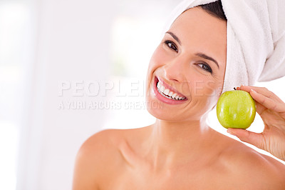 Buy stock photo Happy woman, portrait and nutrition with apple for diet, healthy vitamins or skincare at home. Face of young female person or model with smile and organic green fruit for natural beauty and wellness