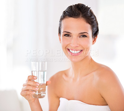 Buy stock photo Portrait of a beautiful woman holding a glass of water
