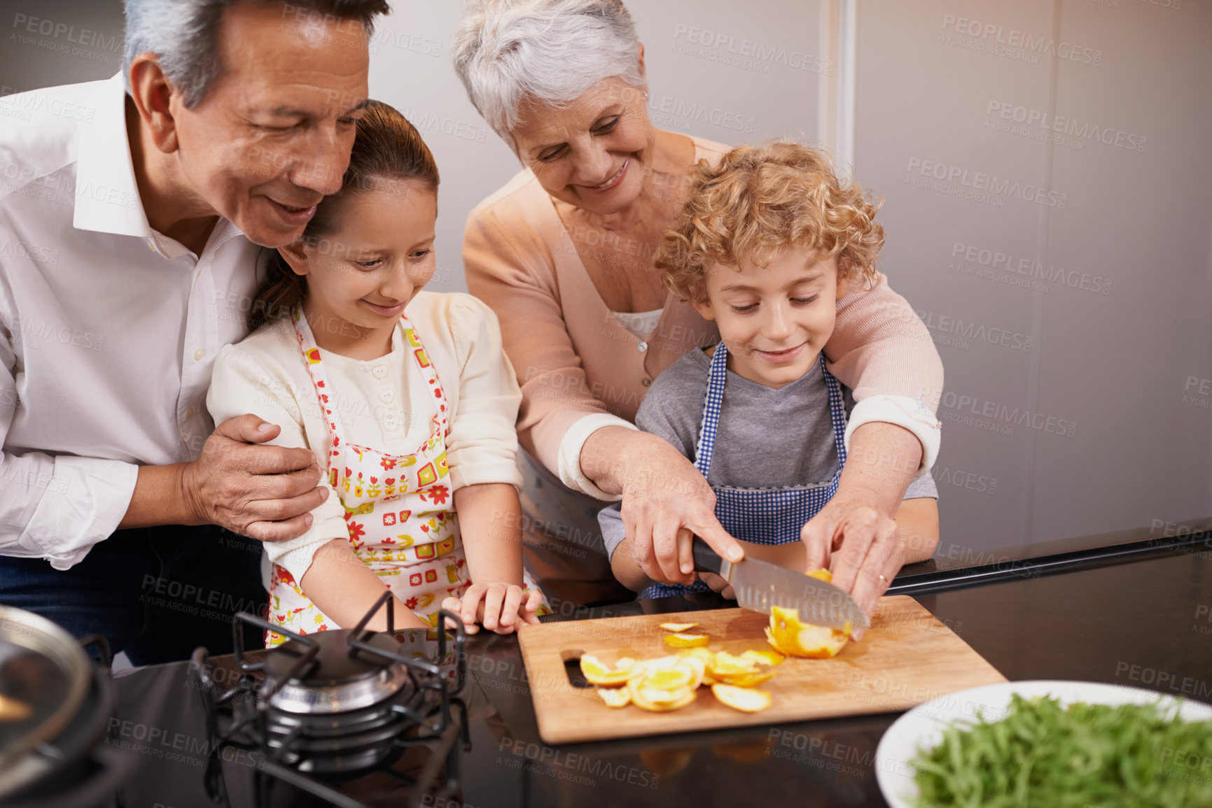 Buy stock photo Food, happy children or grandparents teaching cooking skills for a healthy dinner with fruit or vegetables at home. Kids learning, knife or grandmother with old man or diet meal nutrition in kitchen