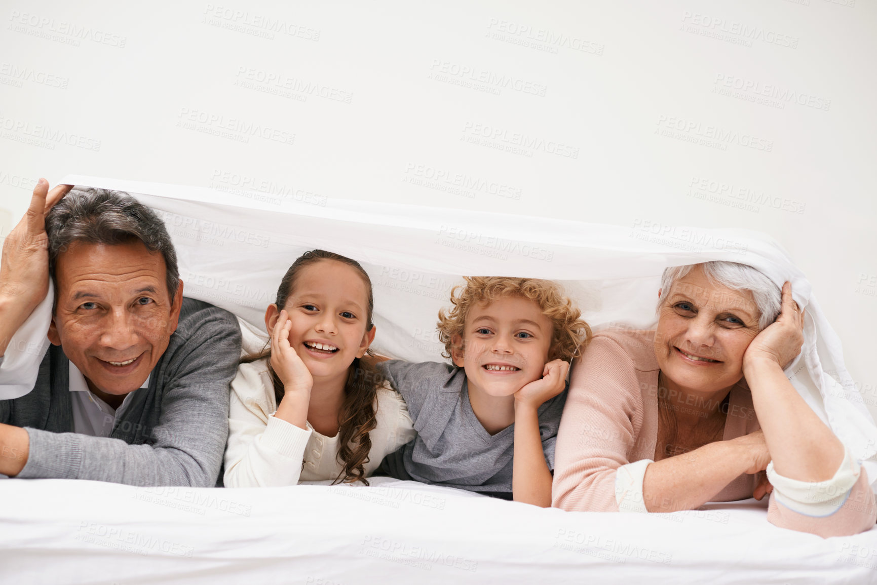 Buy stock photo Portrait, grandparents or happy kids in bedroom to relax together for bonding in Australia with love or care. Morning, faces or grandmother with children or mature old man to enjoy quality bed time 