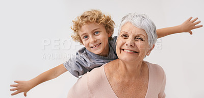 Buy stock photo Airplane, smile and portrait of grandmother with child embrace, happy and bond on wall background. Love, face and senior woman with grandchild having fun playing, piggyback and enjoying game together